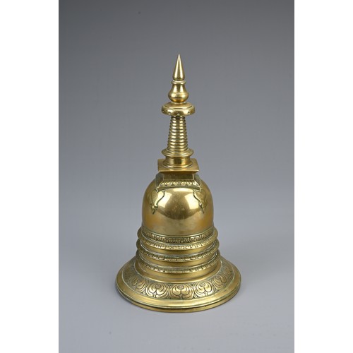 79 - A SOUTHEAST ASIAN POLISHED BRONZE STUPA, CIRCA 1900. In two sections decorated with lappets and flor... 