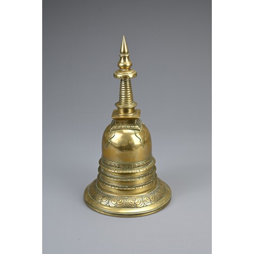 79 - A SOUTHEAST ASIAN POLISHED BRONZE STUPA, CIRCA 1900. In two sections decorated with lappets and flor... 