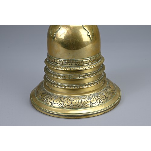 79 - A SOUTHEAST ASIAN POLISHED BRONZE STUPA, CIRCA 1900. In two sections decorated with lappets and flor... 