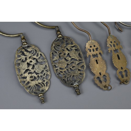 86 - A GROUP OF SIX CHINESE METALWARE BIRDCAGE HOOKS, EARLY 20TH CENTURY. With pierced sections depicting... 