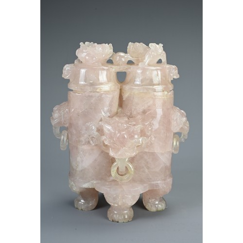 358 - TWO CHINESE CARVED STONE CENSERS, 20TH CENTURY. To include a large rose quartz censer with lion mask... 