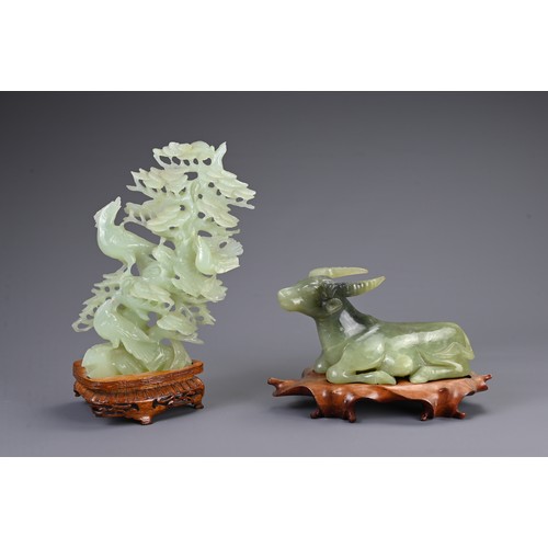 362 - A CHINESE CARVED JADE MODEL OF A RECUMBENT WATER BUFFALO WITH SERPENTINE CARVING, 20TH CENTURY. The ... 