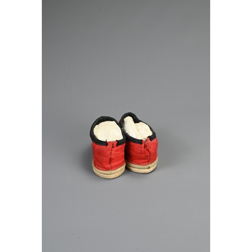 134 - TWO PAIRS OF CHINESE SHOES, EARLY 20TH CENTURY. To include a pair of red ground silk embroidered sho... 