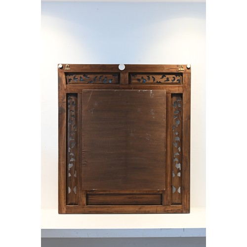 198 - A CARVED AND PIERCED WOOD FRAMED MIRROR, POSSIBLY PERANAKAN, 20TH CENTURY. Of square form with pierc... 