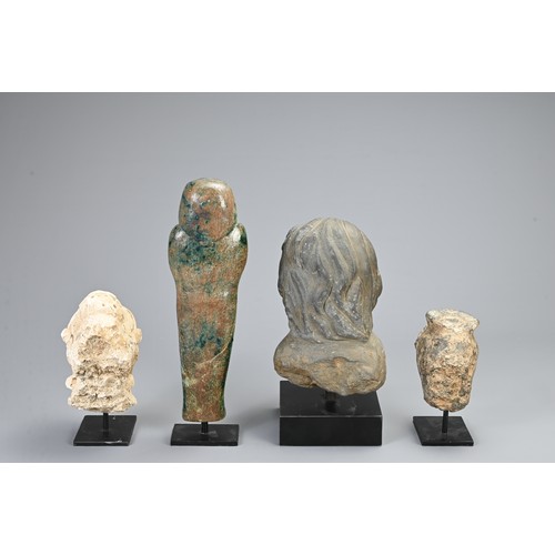 95 - A GROUP OF STONE AND COMPOSITE DECORATIVE ITEMS. To include a green glazed Egyptian Ushabti figure, ... 