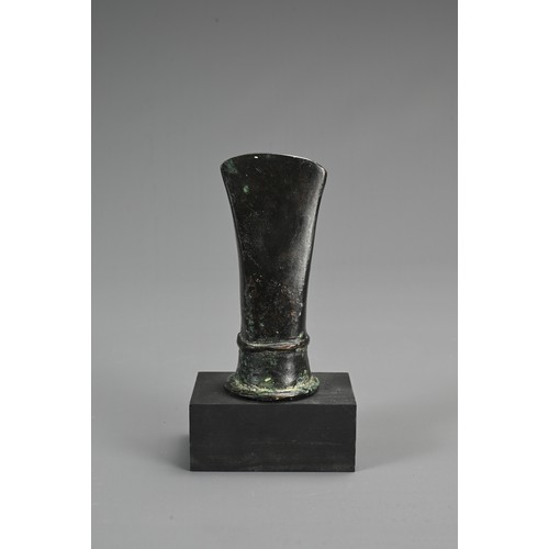 99 - A GROUP OF BRONZE ITEMS, PROBABLY ROMAN AND LATER. To include two axe head fittings, probably Roman;... 