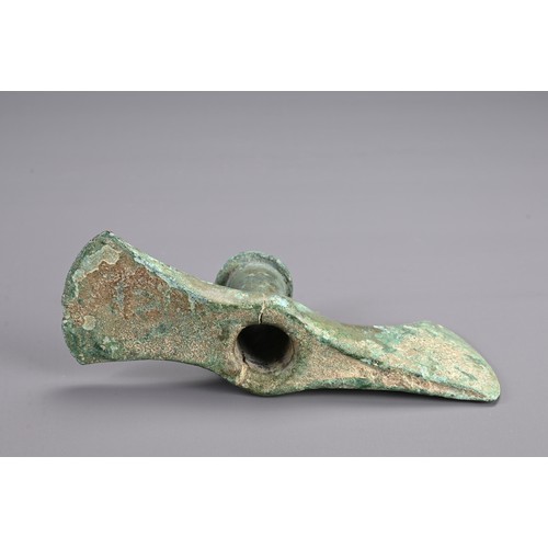 99 - A GROUP OF BRONZE ITEMS, PROBABLY ROMAN AND LATER. To include two axe head fittings, probably Roman;... 