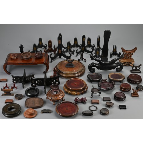 143 - A QUANTITY OF CHINESE WOODEN DISPLAY STANDS AND OTHERS, 20TH CENTURY. To include various circular, r... 