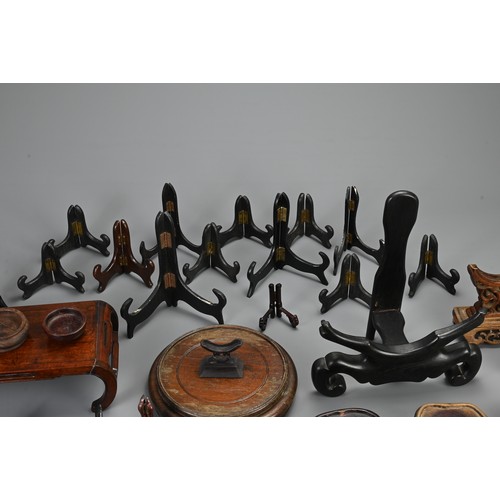 143 - A QUANTITY OF CHINESE WOODEN DISPLAY STANDS AND OTHERS, 20TH CENTURY. To include various circular, r... 