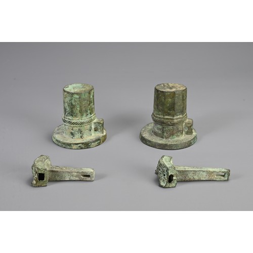 100 - A PAIR OF CHINESE BRONZE CHARIOT AXEL FITTINGS, PROBABLY WARRING STATES / HAN DYNASTY. Each with arc... 