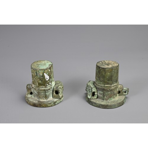 100 - A PAIR OF CHINESE BRONZE CHARIOT AXEL FITTINGS, PROBABLY WARRING STATES / HAN DYNASTY. Each with arc... 