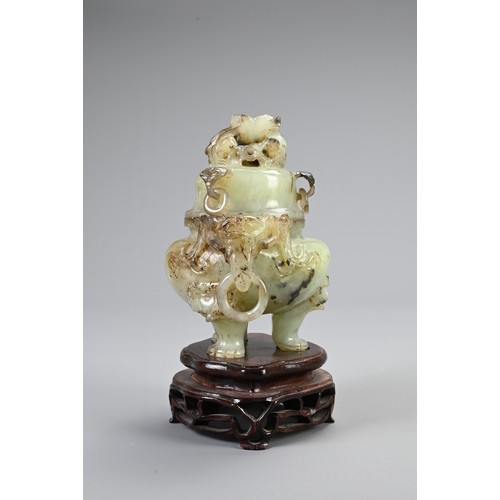 360 - A CHINESE CARVED JADE TRIPOD CENSER, 20TH CENTURY. With animal form ring handles and dragon finial c... 