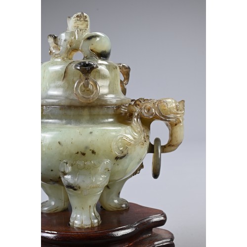 360 - A CHINESE CARVED JADE TRIPOD CENSER, 20TH CENTURY. With animal form ring handles and dragon finial c... 