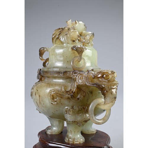 360 - A CHINESE CARVED JADE TRIPOD CENSER, 20TH CENTURY. With animal form ring handles and dragon finial c... 