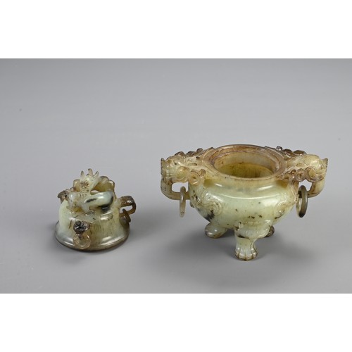 360 - A CHINESE CARVED JADE TRIPOD CENSER, 20TH CENTURY. With animal form ring handles and dragon finial c... 