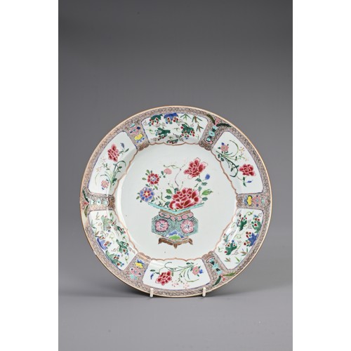 8 - A CHINESE FAMILLE ROSE ENAMELLED PORCELAIN DISH, 18TH CENTURY. Circular dish decorated with potted f... 