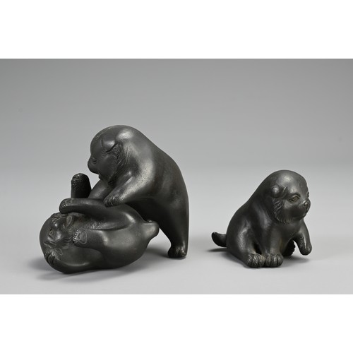 288 - JAPANESE MEIJI PERIOD BRONZE OF THREE PLAYFUL PUPPIES, SIGNED AKIMITSU, early 20th century, signed o... 