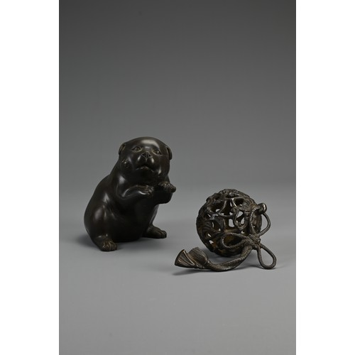 286 - A JAPANESE MEIJI BRONZE PUPPY & BALL, SIGNED YOSHIYAMA, late 19th century, the plump dog depicted wi... 