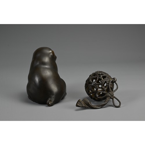 286 - A JAPANESE MEIJI BRONZE PUPPY & BALL, SIGNED YOSHIYAMA, late 19th century, the plump dog depicted wi... 