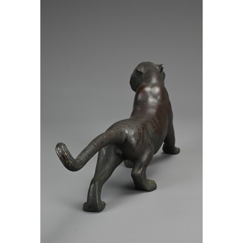 287 - JAPANESE MEIJI PERIOD BRONZE, TIGER OKIMONO BY NYOZAN, late 19th century, with inlaid glass eyes, si... 