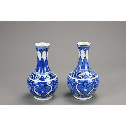 129 - A PAIR OF CHINESE BLUE AND WHITE PORCELAIN VASES, 19/20TH CENTURY. Of baluster form decorated with r... 