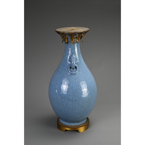 136 - A LARGE CHINESE MONOCHROME BLUE GLAZED CRACKLE VASE, 18/19TH CENTURY. Of baluster form with twin ani... 