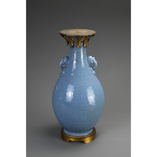 136 - A LARGE CHINESE MONOCHROME BLUE GLAZED CRACKLE VASE, 18/19TH CENTURY. Of baluster form with twin ani... 