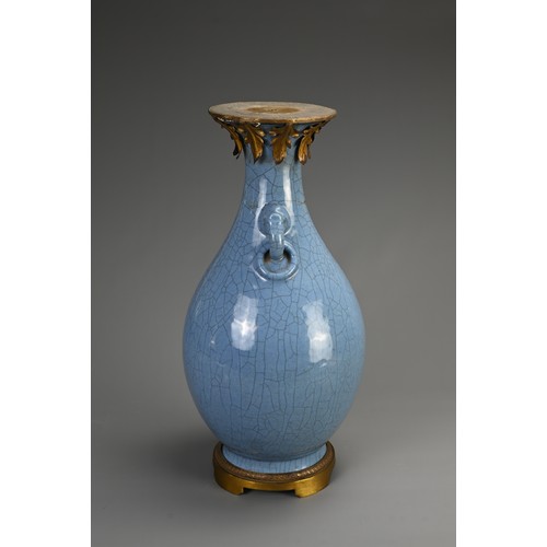 136 - A LARGE CHINESE MONOCHROME BLUE GLAZED CRACKLE VASE, 18/19TH CENTURY. Of baluster form with twin ani... 