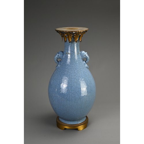 136 - A LARGE CHINESE MONOCHROME BLUE GLAZED CRACKLE VASE, 18/19TH CENTURY. Of baluster form with twin ani... 