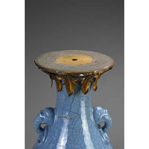 136 - A LARGE CHINESE MONOCHROME BLUE GLAZED CRACKLE VASE, 18/19TH CENTURY. Of baluster form with twin ani... 