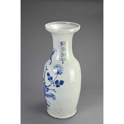 138 - A LARGE CHINESE CELADON GROUND BLUE AND WHITE PORCELAIN VASE, 19TH CENTURY. Of baluster form with mo... 