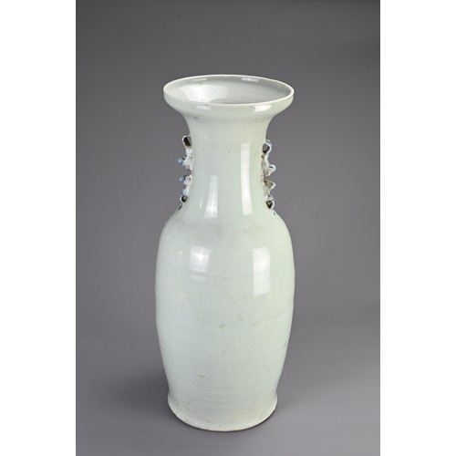 138 - A LARGE CHINESE CELADON GROUND BLUE AND WHITE PORCELAIN VASE, 19TH CENTURY. Of baluster form with mo... 