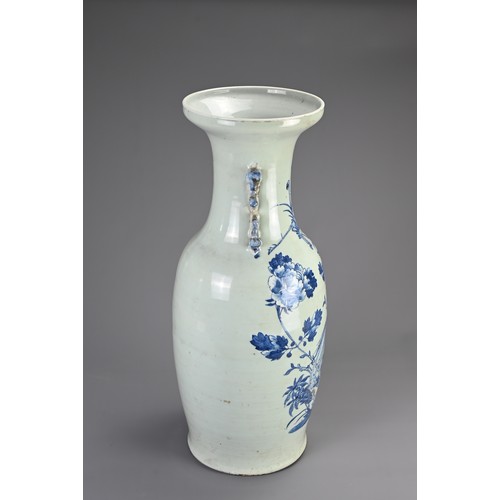 138 - A LARGE CHINESE CELADON GROUND BLUE AND WHITE PORCELAIN VASE, 19TH CENTURY. Of baluster form with mo... 