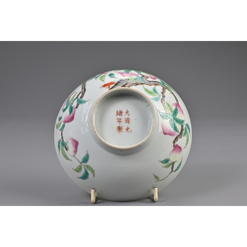 107 - A CHINESE FAMILLE ROSE PORCELAIN BOWL, 19/20TH CENTURY. Rounded bowl decorated with nine peaches on ... 