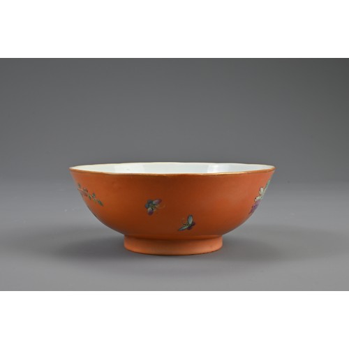 114 - A CHINESE ORANGE GROUND FAMILLE ROSE PORCELAIN BOWL, 19TH CENTURY. Rounded bowl decorated with pheas... 