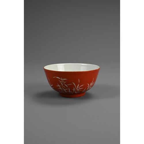 162 - A CHINESE CORAL GROUND 'BAMBOO' PORCELAIN BOWL, 19/20TH CENTURY. Rounded bowl decorated with bamboo ... 