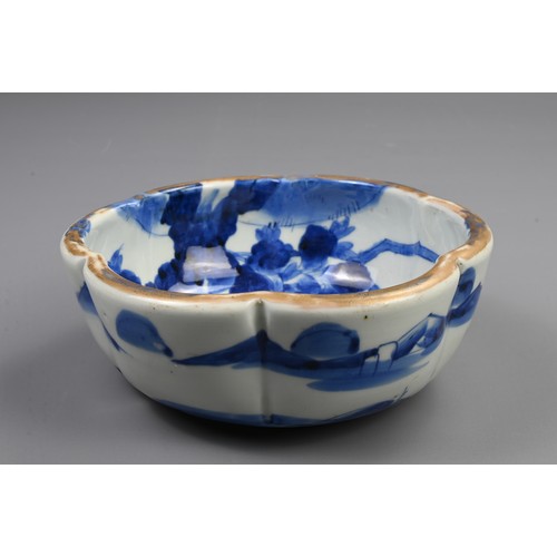 265 - THREE 19TH CENTURY JAPANESE PORCELAIN BLUE AND WHITE LOBED GRADUATED BOWLS AND A GILT BOWL AND COVER... 