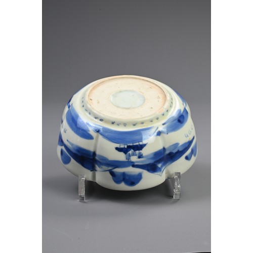 265 - THREE 19TH CENTURY JAPANESE PORCELAIN BLUE AND WHITE LOBED GRADUATED BOWLS AND A GILT BOWL AND COVER... 