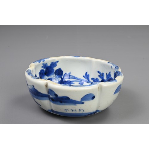 265 - THREE 19TH CENTURY JAPANESE PORCELAIN BLUE AND WHITE LOBED GRADUATED BOWLS AND A GILT BOWL AND COVER... 