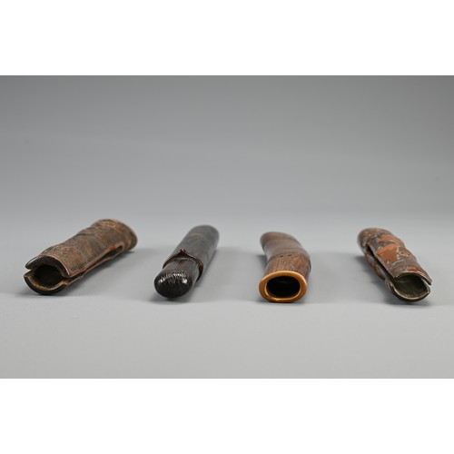 295 - FOUR JAPANESE EDO PERIOD PIPE CASES (KISERUZUTSU), 19th Century, Comprising one of wood, of otoshi-z... 