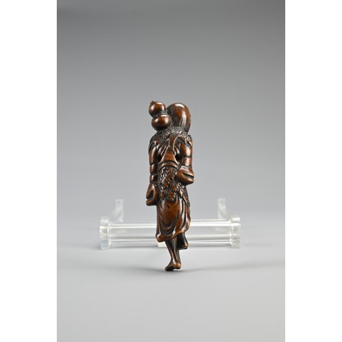 298 - JAPANESE EDO BOXWOOD NETSUKE OF CHOKARO SENNIN, 18th century, standing on one foot, with one hand st... 