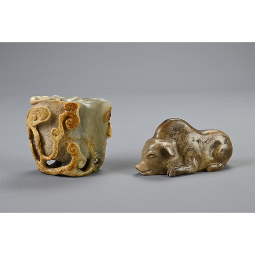 110 - TWO CHINESE NEPHRITE JADE CARVINGS, MING OR LATER. To include a libation cup carved in relief with l... 