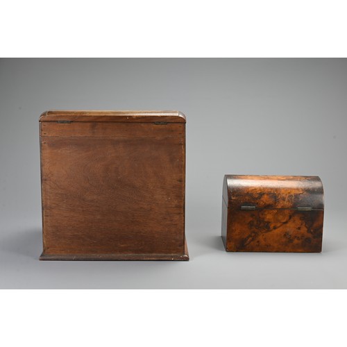 355 - AN EDWARDIAN WALNUT STATIONARY BOX AND A 19TH CENTURY DOMED RECTANGULAR TEA CADDY. The hinged statio... 