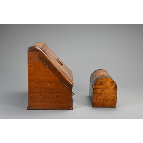 355 - AN EDWARDIAN WALNUT STATIONARY BOX AND A 19TH CENTURY DOMED RECTANGULAR TEA CADDY. The hinged statio... 