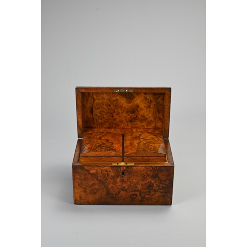 355 - AN EDWARDIAN WALNUT STATIONARY BOX AND A 19TH CENTURY DOMED RECTANGULAR TEA CADDY. The hinged statio... 