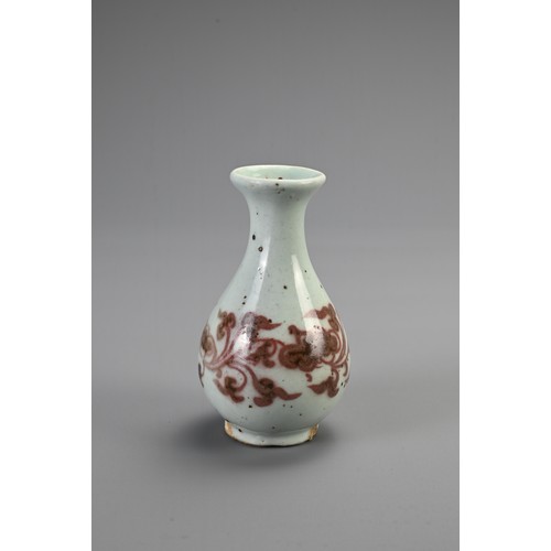 172 - A CHINESE COPPER RED DECORATED PEAR SHAPED BOTTLE VASE, YUAN DYNASTY OR LATER. Pear shaped with ever... 