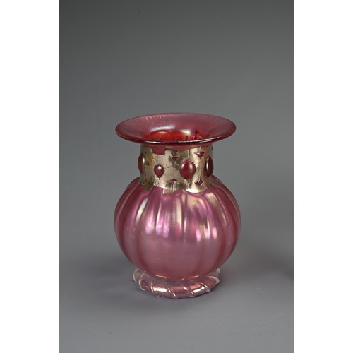 352 - THREE ART GLASS VASES BY ANTHONY STERN. Each with etched signature to base, with pink lustred bodies... 