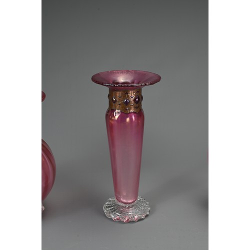 352 - THREE ART GLASS VASES BY ANTHONY STERN. Each with etched signature to base, with pink lustred bodies... 