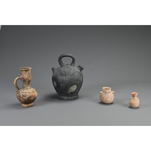 183 - A GROUP OF EUROPEAN POTTERY ITEMS, 19TH CENTURY AND EARLIER. To include a burnished black pottery ew... 