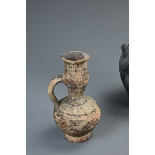 183 - A GROUP OF EUROPEAN POTTERY ITEMS, 19TH CENTURY AND EARLIER. To include a burnished black pottery ew... 